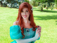 woman with red hair and blue princess dress