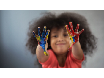 child with finger paint