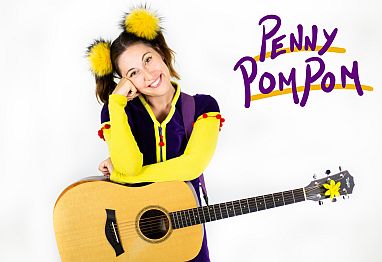 Penny Pom Pom with her guitar