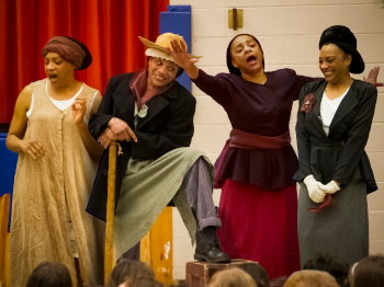 Four Black women perform Things My Fore-Sisters Saw